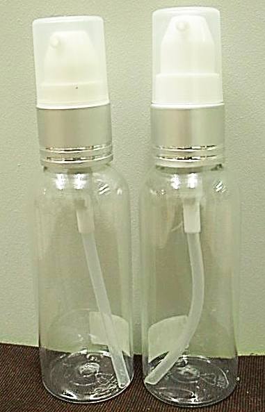 ขวดPET กลม 50ml + ปั้มจุ๊บขาวเงินด้านคาดริ้วเงินฝาครอบใส คอ 18 มม.