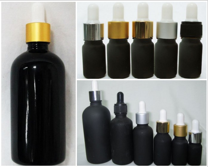 ขวดแก้วอโรมาสีดำใสฝาดรอปเปอร์สีทองด้านจุกขาว