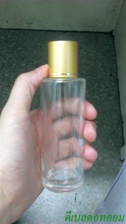 ขวดแก้วใส100ml+ฝาเกลียวเล็ก(บาง)สีทองด้านคาดริ้วเงิน1เส้นคอ 24 มม.+จุกยาง แผ่นรอง
