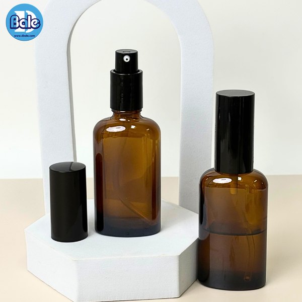 ขวดแก้วทรงแบน+หัวปั๊ม สีใส, ชาใส 50ml. c012