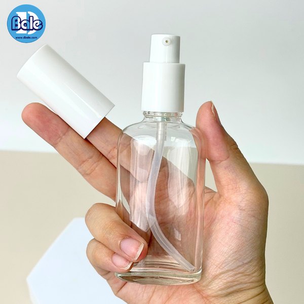 ขวดแก้วทรงแบน+หัวปั๊ม สีใส, ชาใส 50ml. c012
